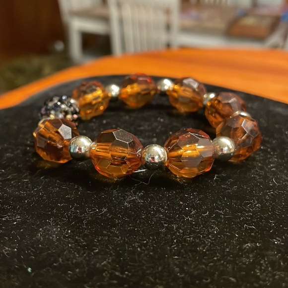 8” stackable stretch bracelet with 8 amber color & 9 silver tone beads - Picture 8 of 13